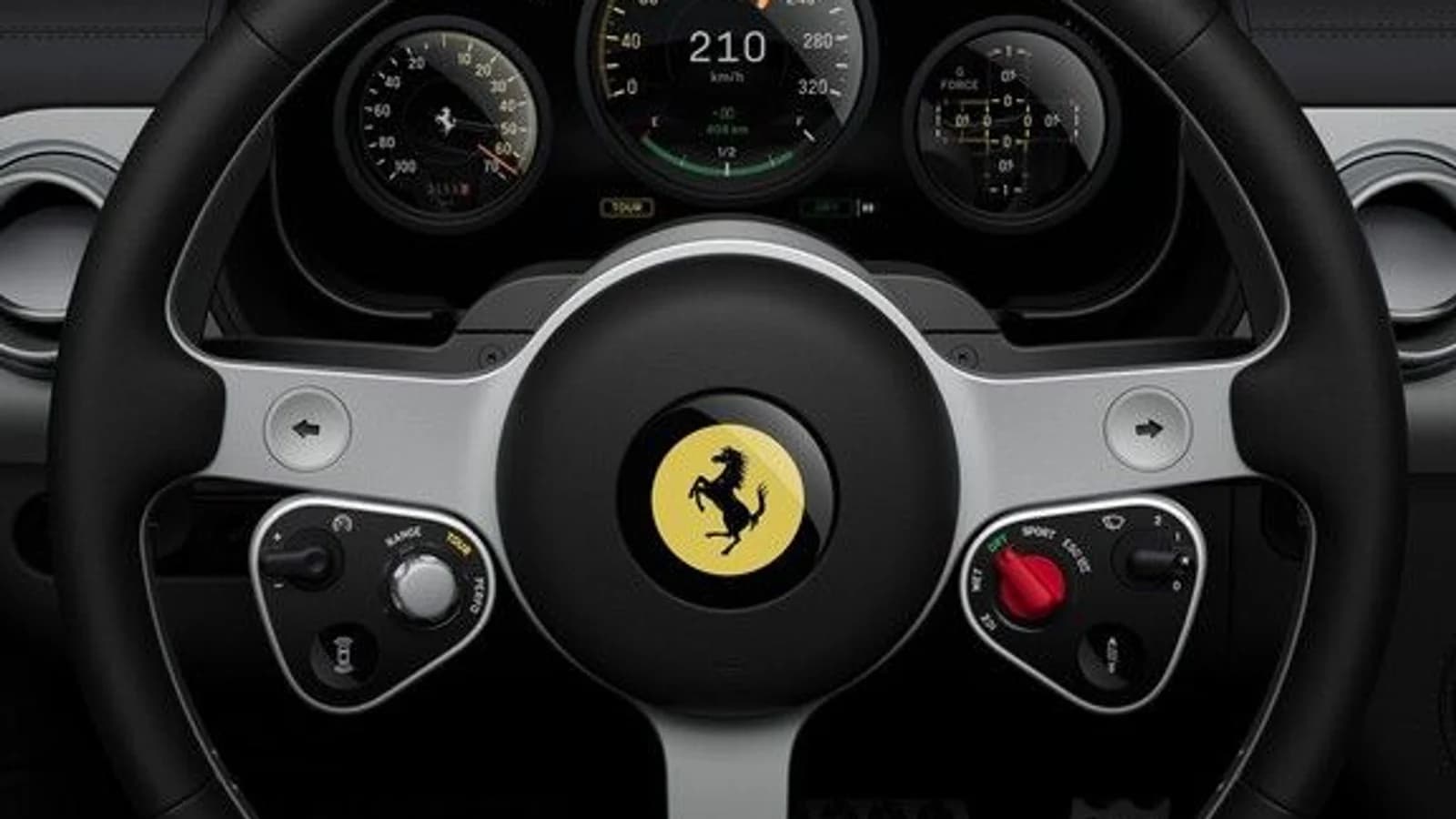 Volante di una Ferrari con stemma del Cavallino e comandi multifunzione.